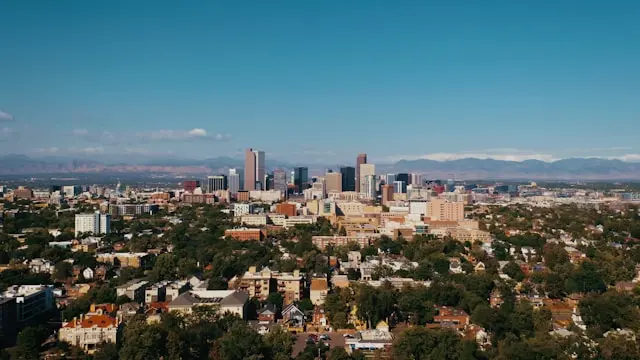 Aerial view of downtown Denver and the Front Range foothills representing Taylor Appraising’s residential service area across the Denver Metro counties.